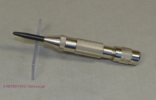 Automatic center punch